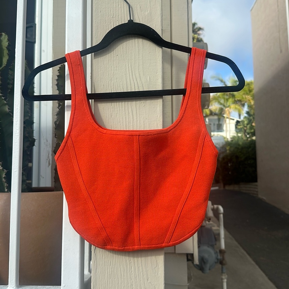 Aritzia sculpt knit top in orange.